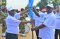 The EASF Director (left) hands over the flag to the Burundi Defence Minister (right) 