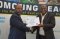 The EASF Director presents a Certificate of Service to the outgoing Deputy Chief of Staff